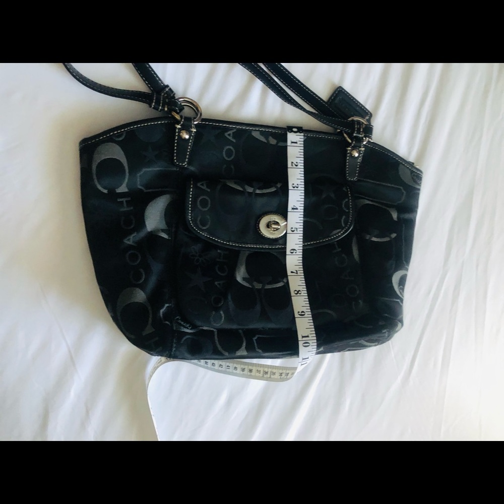 Neatly used Coach Hand bag.See pictures for measurements